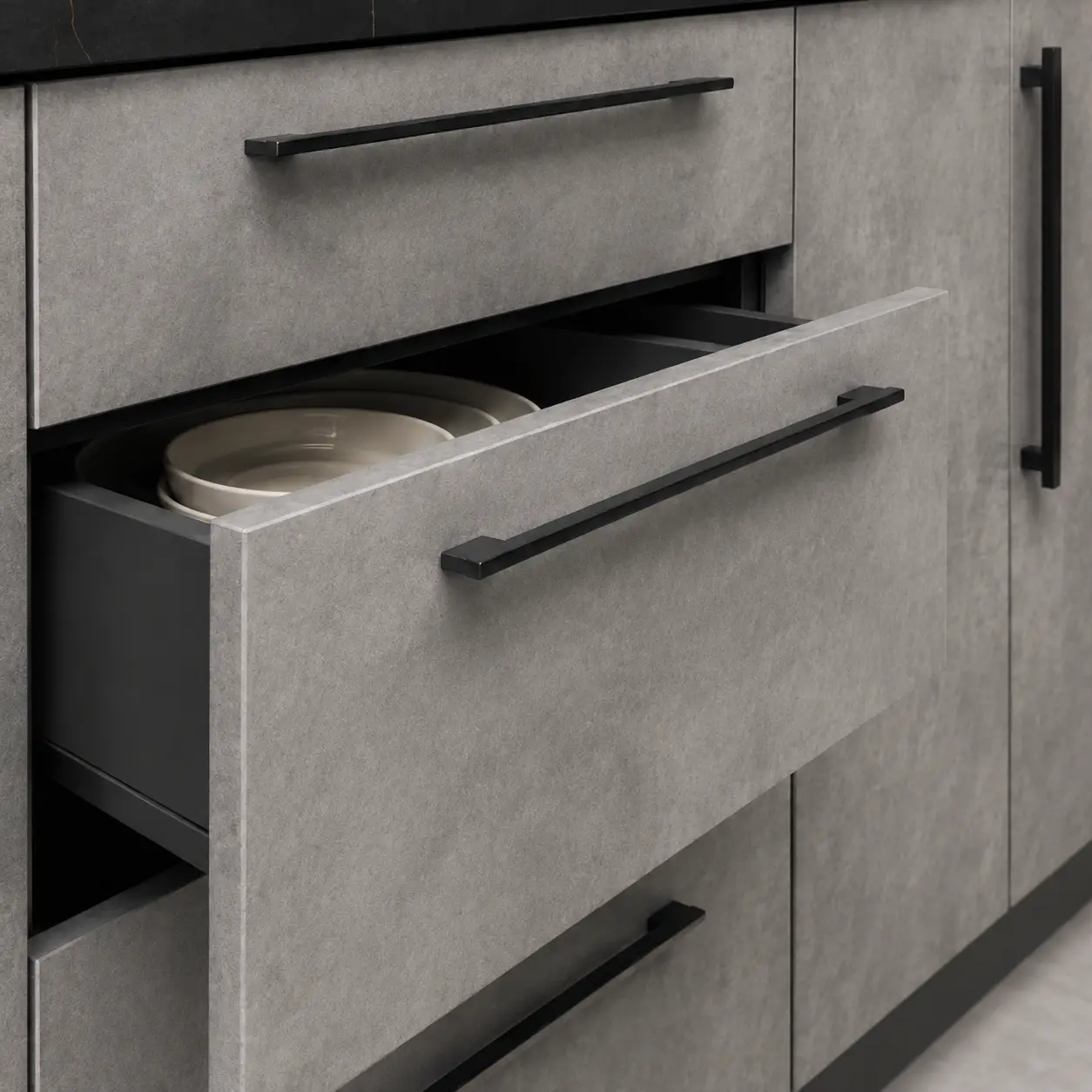 Modern modular kitchen drawer with sleek black designer handle for easy opening and contemporary style