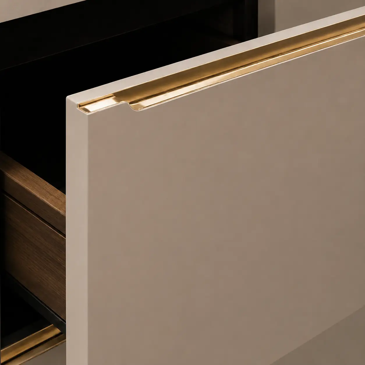 Premium gold profile handle installed on a modular kitchen cabinet door for a seamless finish